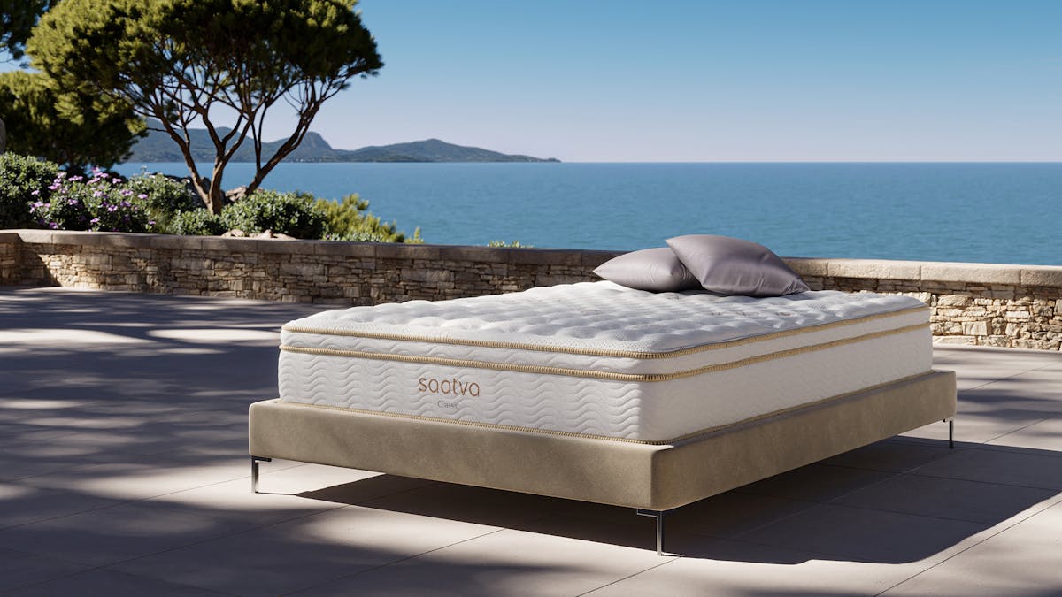 Saatva Classic mattress, Luxury Firm 11.5-inch profile, photographed in our test bedroom
