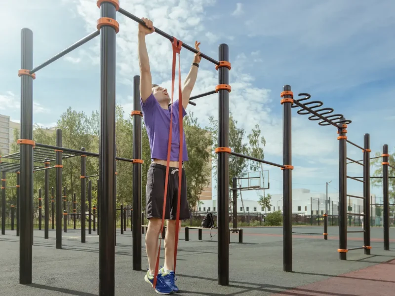 Band-Assisted Pull-Up: How to Do It, Muscles Worked & Common Mistakes