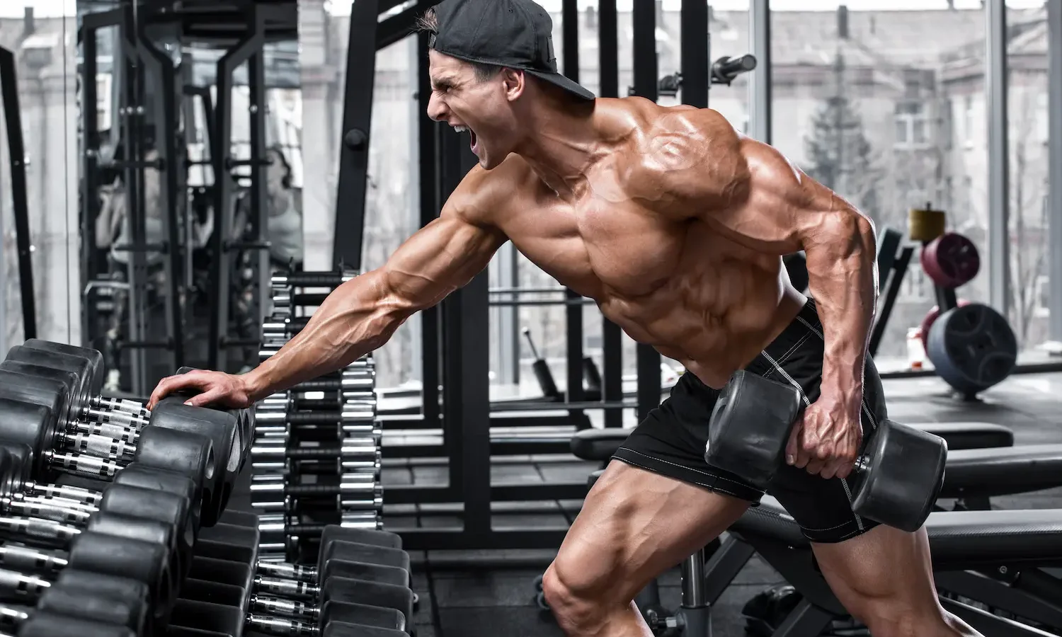 Dumbbell Row: How to Do It, Muscles Worked & Common Mistakes