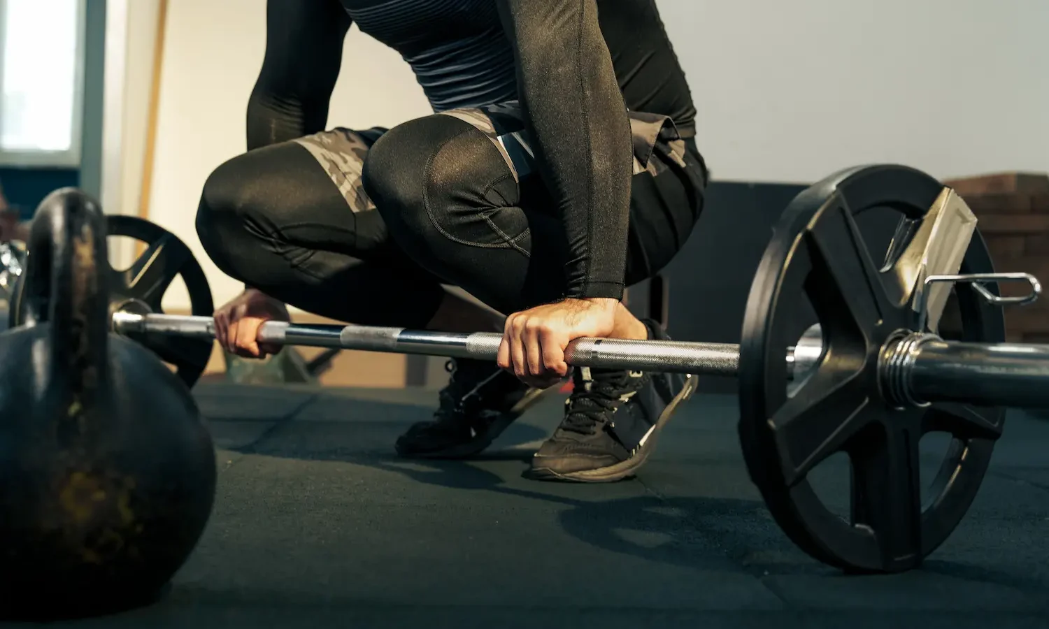 Snatch-Grip Romanian Deadlift: How to Do It, Muscles Worked & Common Mistakes